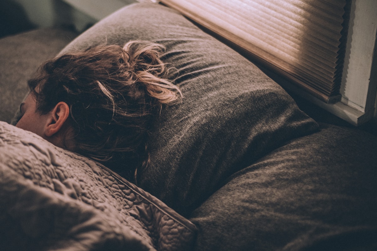 Person feeling energized and awake after quality sleep